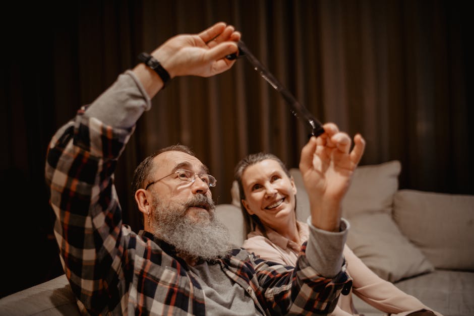 Happy senior couple laughing and enjoying their time together indoors.